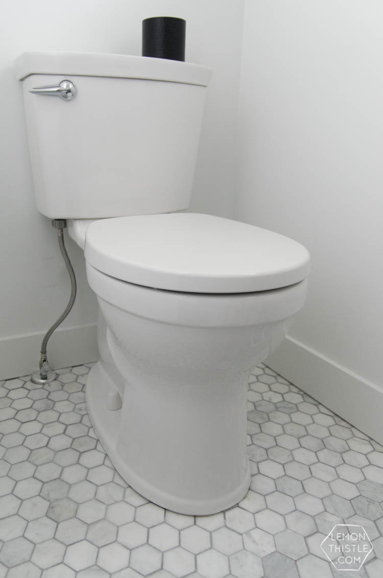 Classic Bathroom Makeover with marble hexagon tile and Modern Details- love the matte black with the chrome!