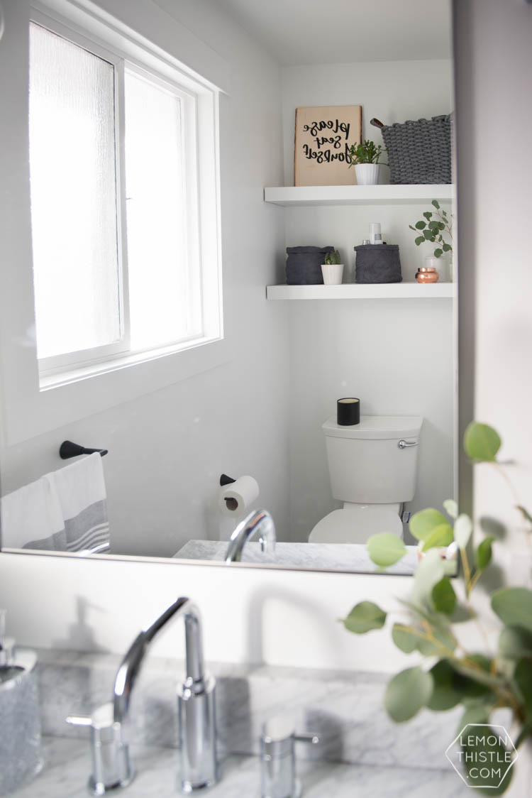 Classic Bathroom Makeover with marble hexagon tile and Modern Details- love the matte black with the chrome!