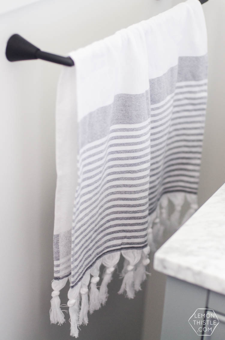 Classic Bathroom Makeover with marble hexagon tile and Modern Details- love the matte black with the chrome!