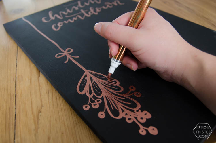 DIY Christmas Countdown Chalkboard with Copper Leafing- love that copper detail!