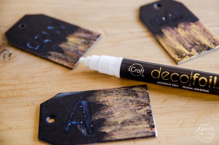 DIY Black and Gold Foil Brush Strokes Gift Tags- I love this foil technique! Perfect for holiday gifts