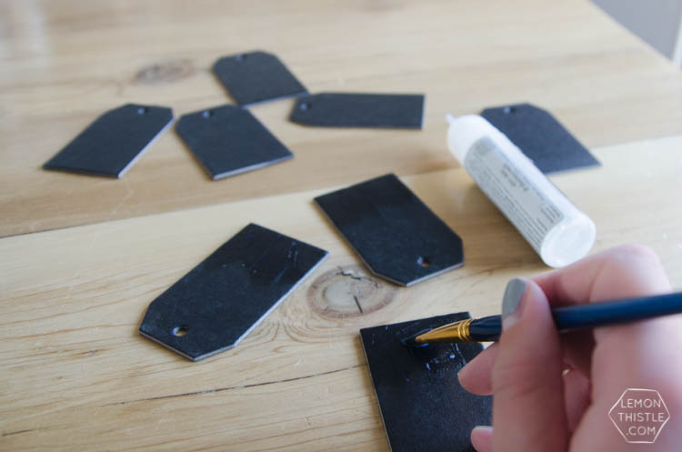 DIY Black and Gold Foil Brush Strokes Gift Tags- I love this foil technique! Perfect for holiday gifts