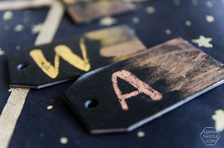 DIY Black and Gold Foil Brush Strokes Gift Tags- I love this foil technique! Perfect for holiday gifts