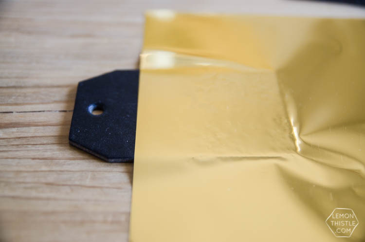 DIY Black and Gold Foil Brush Strokes Gift Tags- I love this foil technique! Perfect for holiday gifts