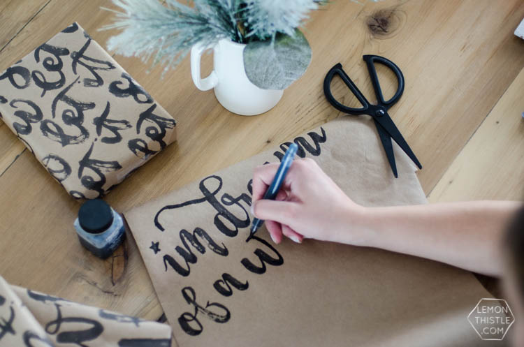 This handlettered Kraft wrapping paper is amazing! Now I want that brush so I can make some to wrap my christmas gifts