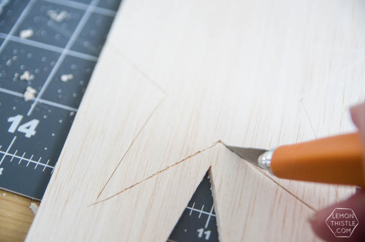 DIY Paint Dipped Wooden Star Place Cards- love that you don't need any tools to cut these wood stars! Such beautiful place settings that can be taken home as gifts after the dinner party