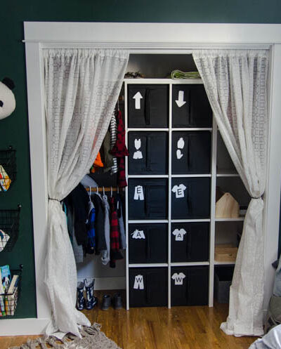 DIY Closet Organization- Ikea Storage Bin Labels... what a great storage solution! I love how it hides the closet clutter and kids can visually see where to put clothes away
