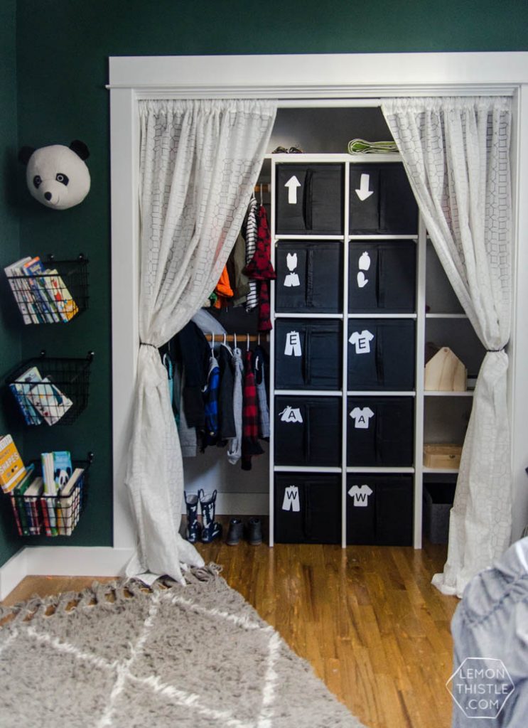 DIY Closet Organization- Ikea Storage Bin Labels... what a great storage solution! I love how it hides the closet clutter and kids can visually see where to put clothes away