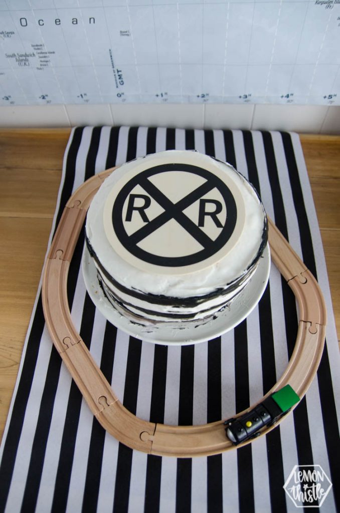 railroad cake and wooden topper made with iron on lite and a wood round