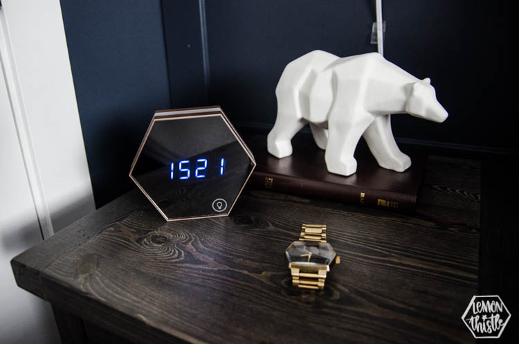 masculine details on nightstand- modern digital alarm clock
