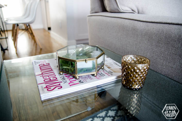 thrifted curio on side table