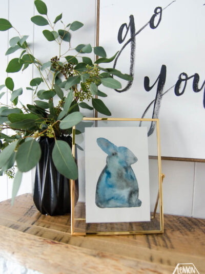 Watercolour rabbit with vase of seeded eucalyptus for spring mantel decor