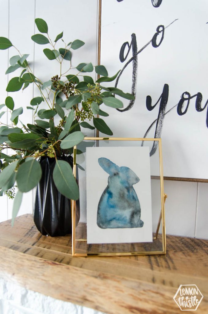 Watercolour rabbit with vase of seeded eucalyptus for spring mantel decor