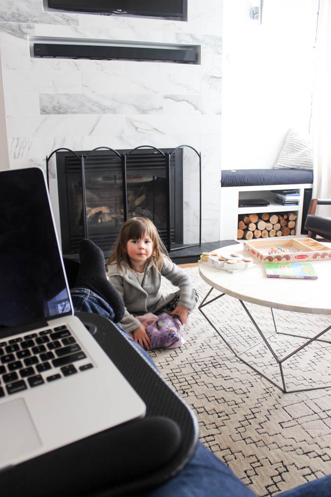 Working at laptop with kids at home