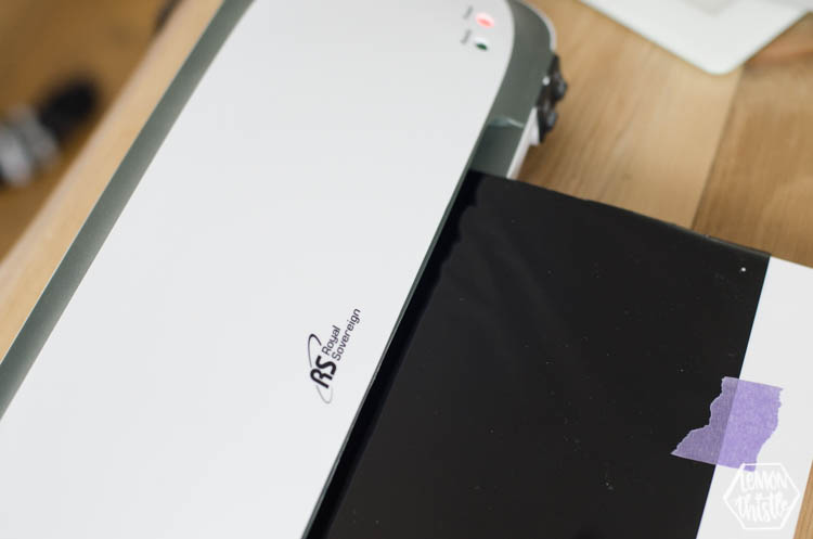 using a laminator to apply black foil to design