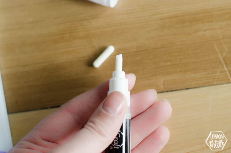 switch to the chisel tip on the adhesive pen