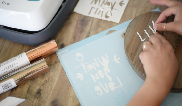 Place your adhesive design on your surface