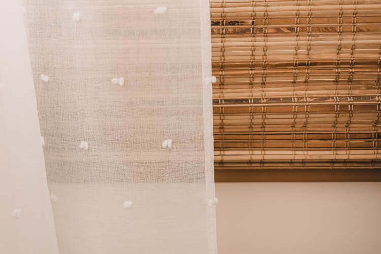 Sheer curtains over bamboo shade- great texture!