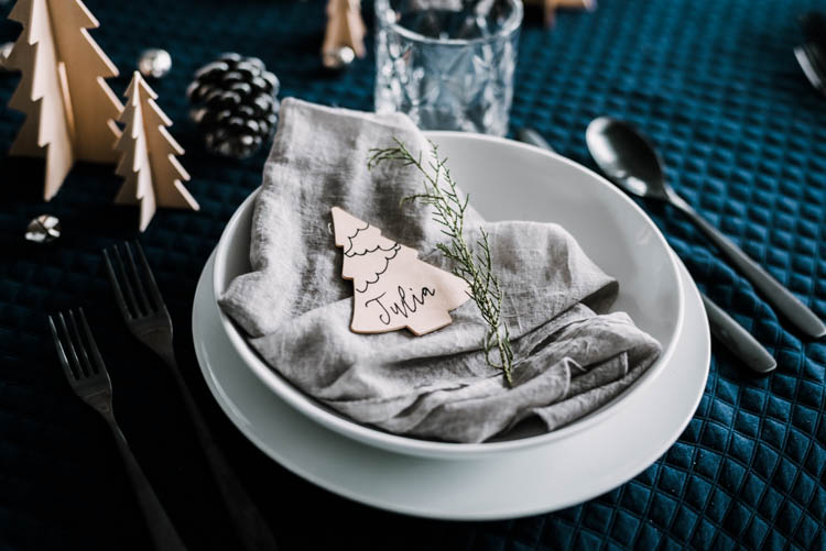 Cute little wooden place cards for a modern christmas table setting