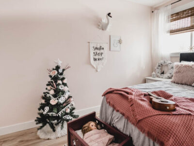 Cute little christmas tree in a girls bedroom