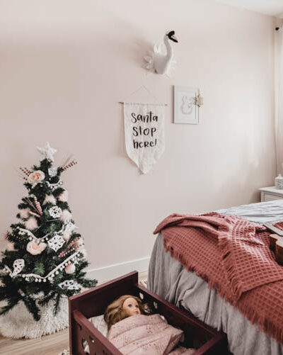Cute little christmas tree in a girls bedroom