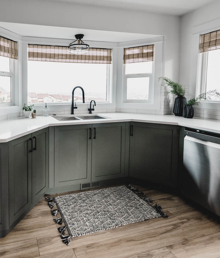 Kitchen cabinets in a bay window- love this layout