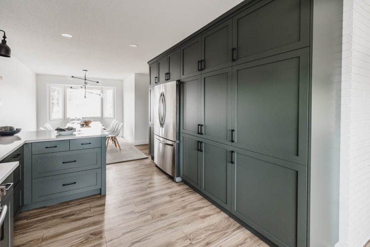 Full wall of pantry storage around a chimney... such a great use of space!