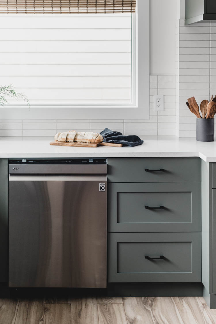 Stacked long subway tiles in a handmade look- helps it look not too modern!