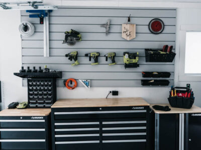 I love this for a small garage turned workshop while still having great storage! Garage Workshop Transformation - before and after + details