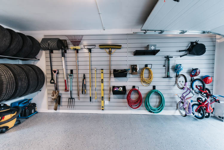 Massive slat wall storage for a small garage