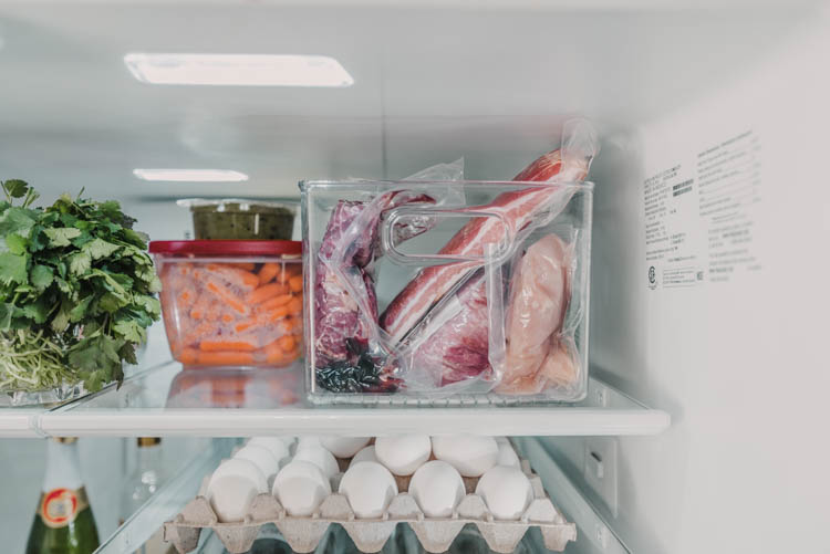 Have a dedicated container for meat thawing in fridge