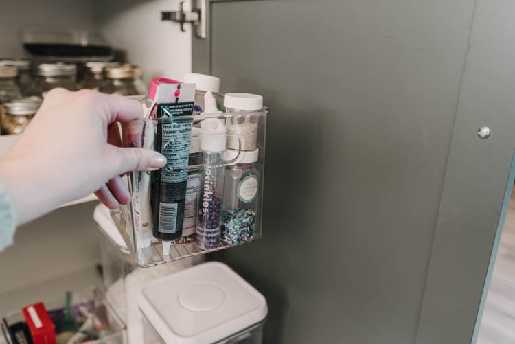 Small clear plastic cubes for storing baking supplies like sprinkles