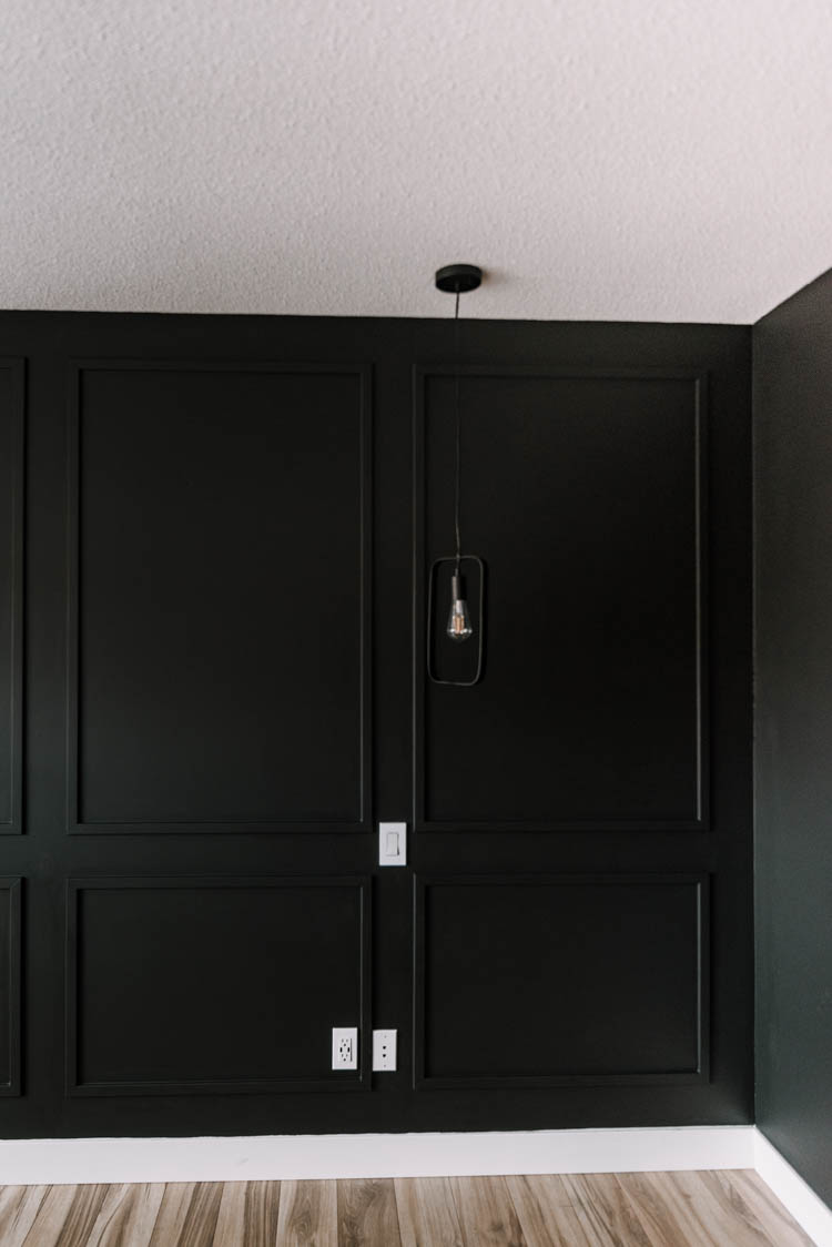 DIY Moulding Wall tips and video tutorial- black picture frame moulding wall in bedroom
