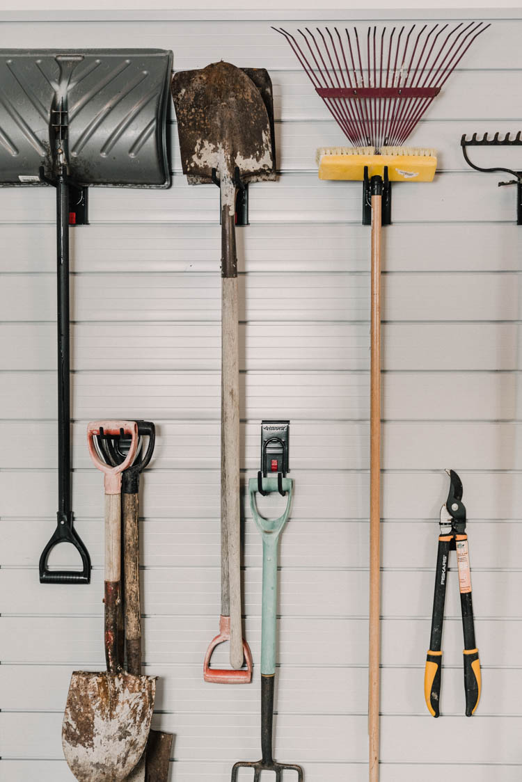 Yard tools on a slat wall... great tips to install it!