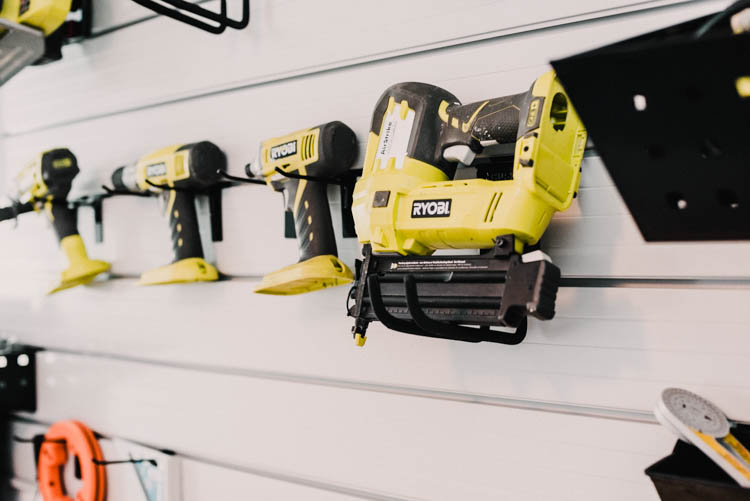 Slat wall for tool storage- sharp blades up high, out of kids reach