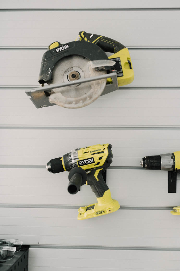 Slat wall for tool storage- sharp blades up high, out of kids reach