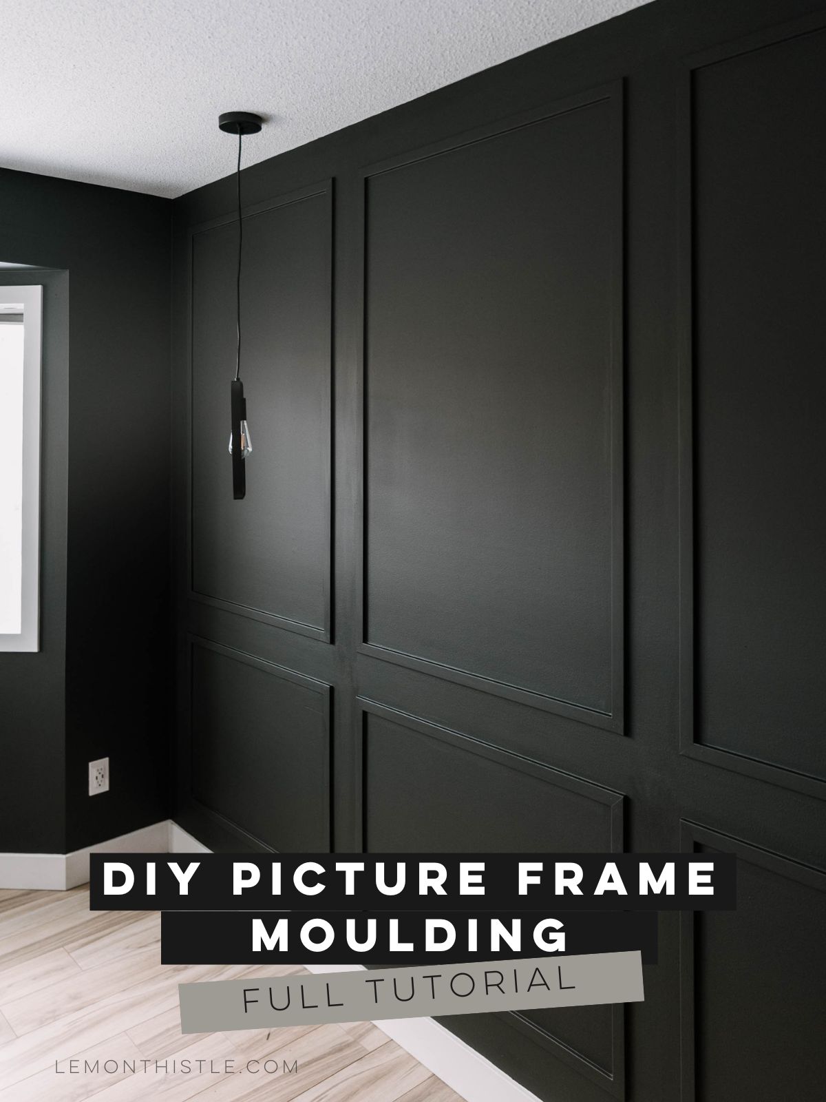 diy box moulding wall as bedroom feature, image of finished moulding wall painted black with light wood flooring. text over reads diy picture frame moulding