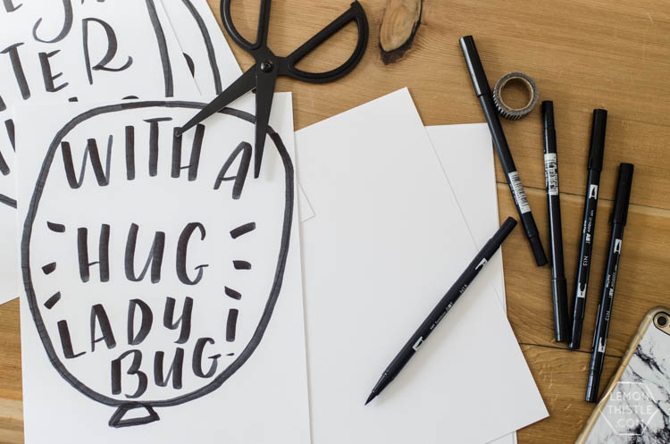 'with a hug ladybug' simple going away party decor