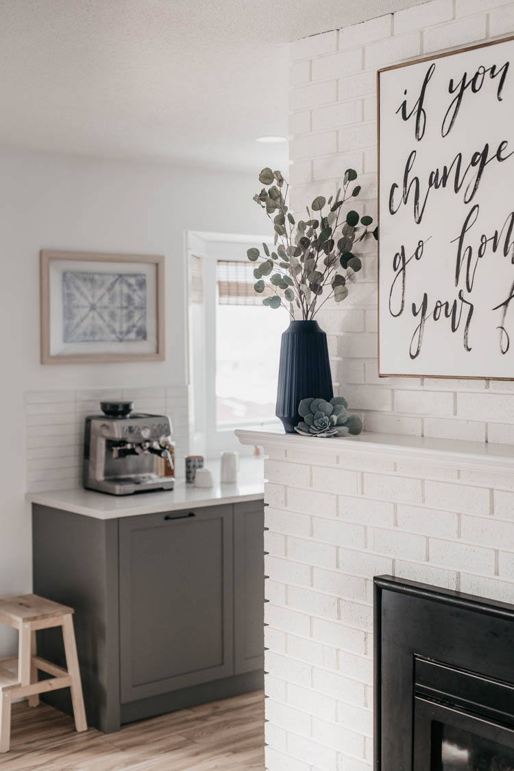 Spring home tour full of fresh greenery, bright whites and warm wood details.