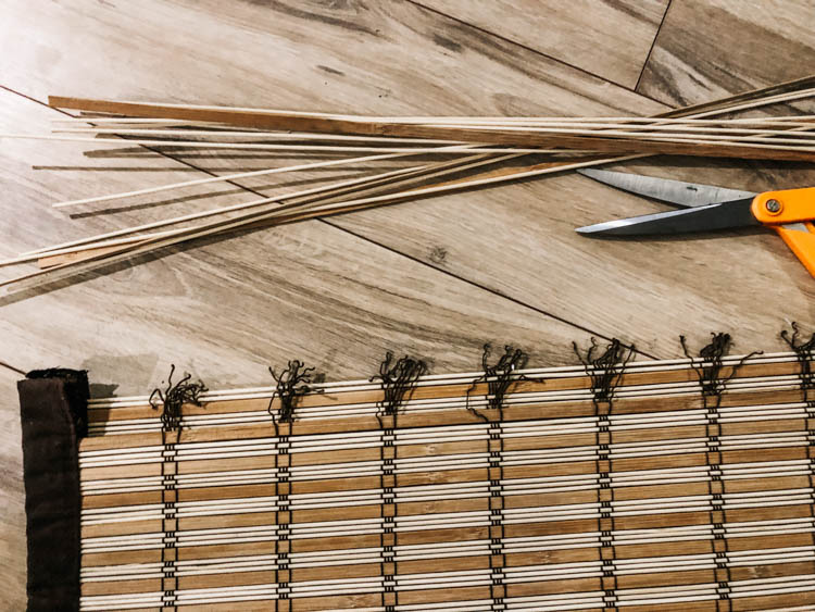 Tie off the ends of the wood shade