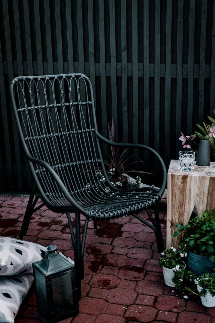 Choosing modern furniture for a traditional brick patio