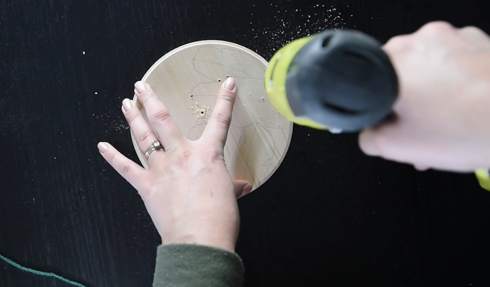 Drill holes into wood for embroidery