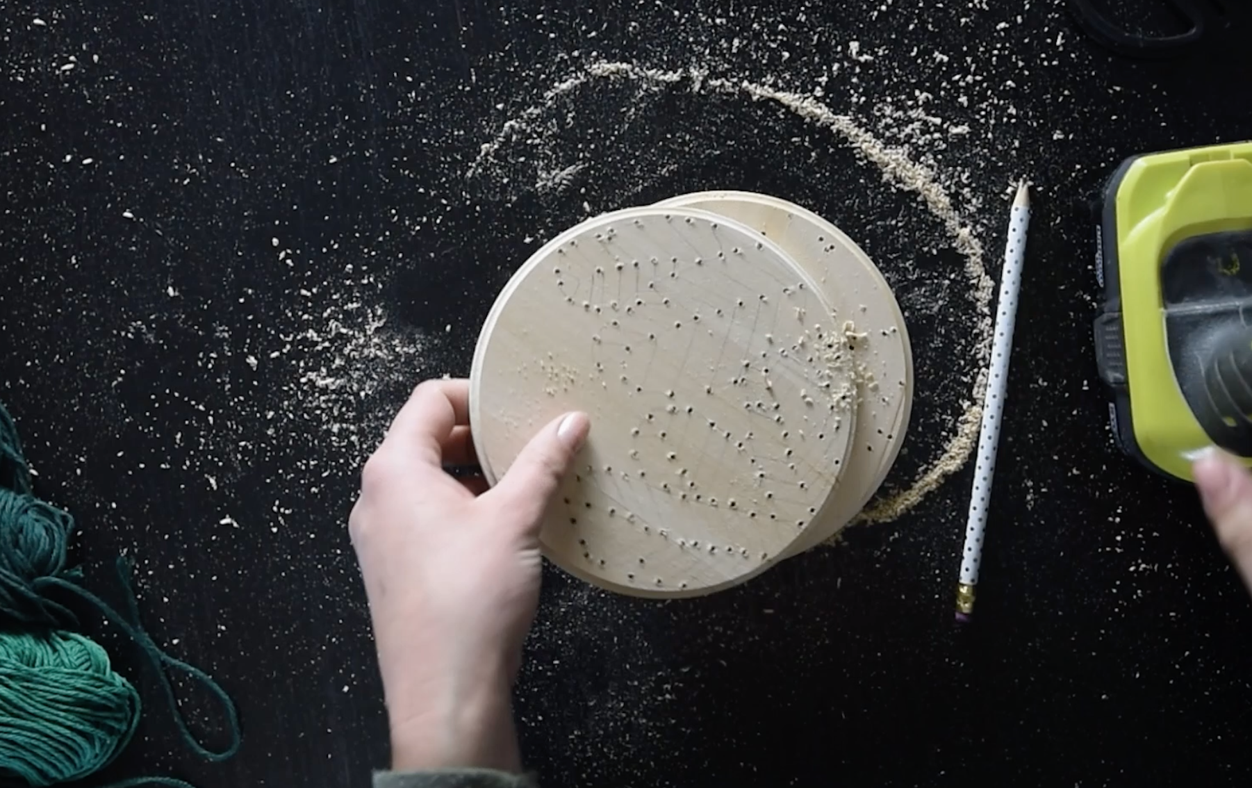 Drill holes into wood for embroidery