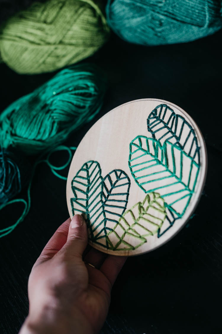 How to embroider on wood- love this modern take on a botanical embroidery hoop!