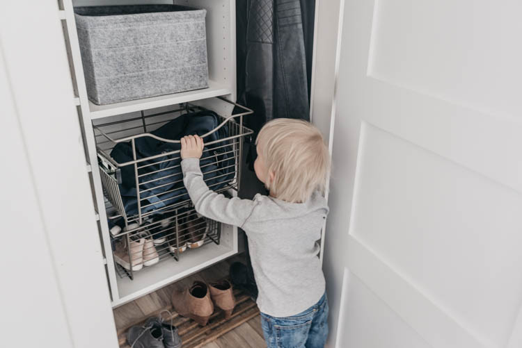 Tips to maximize storage in entry way closet organization for a family- these wire baskets are a great alternative to drawers for kids!