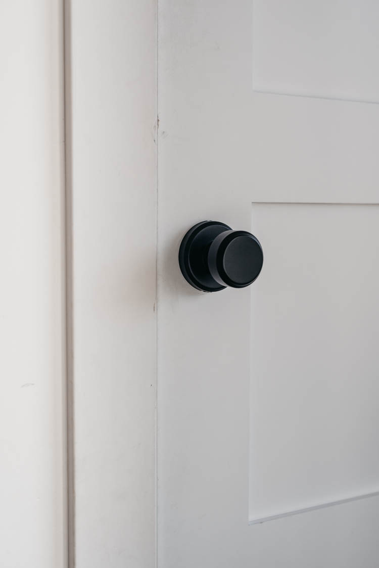 Simple black door knob- so beautiful and modern!