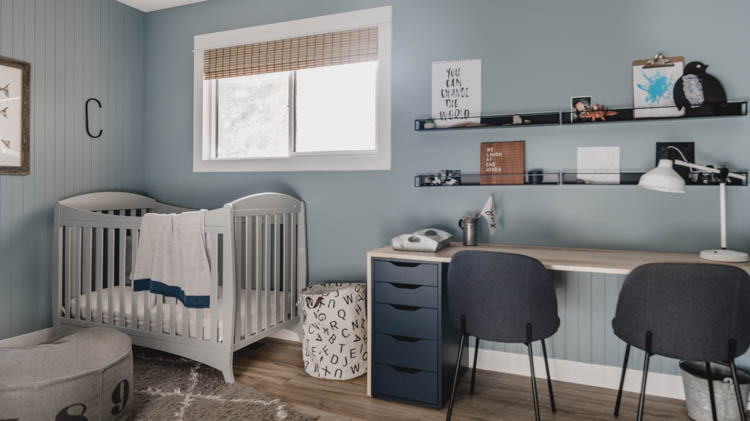 built in desk and crib in a shared boys room