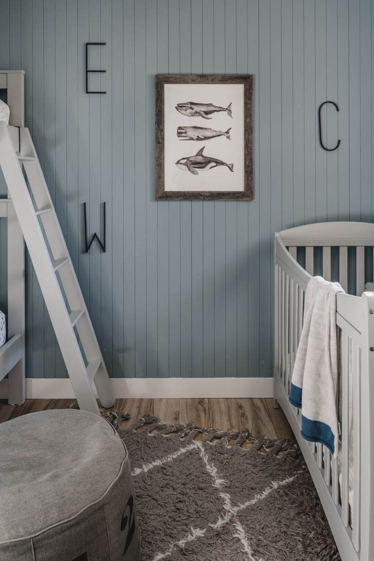 Skinny vertical shiplap wall for a boys shared bedroom