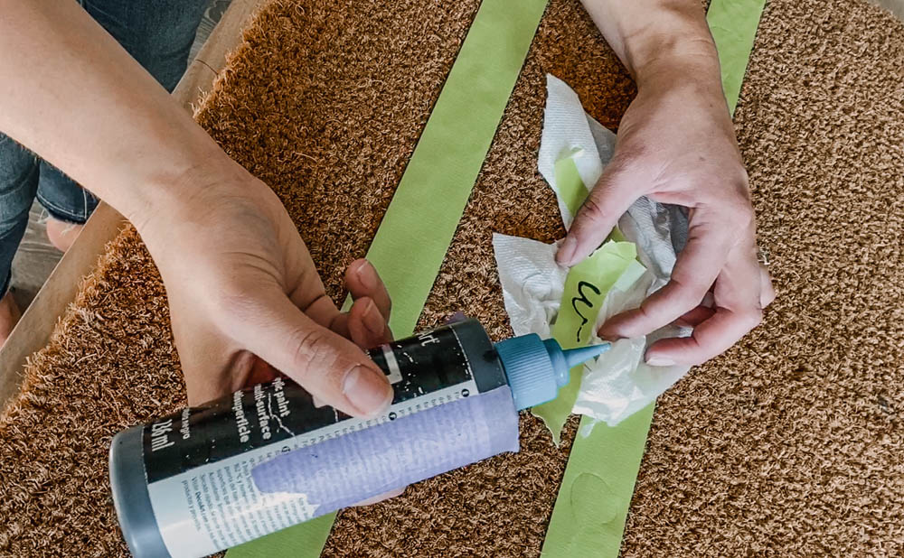 How to paint door mats (showing applicator tip for paint)