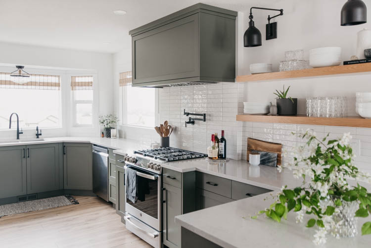 Beautiful green kitchen with summer foliage for decor